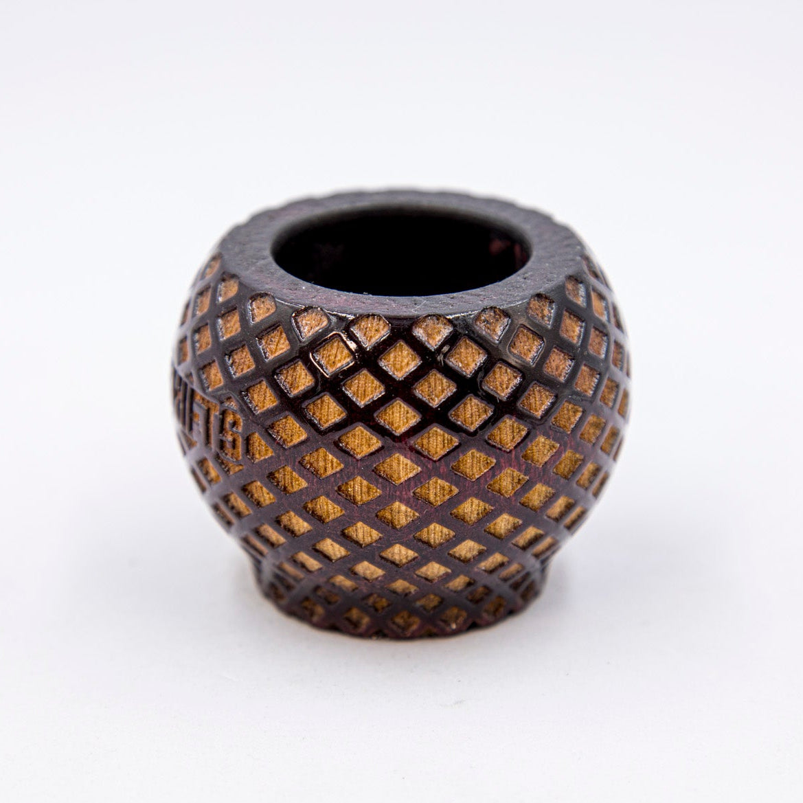 Black ceramic vase with textured surface on a white background