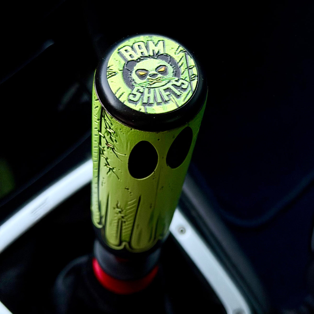 Ghosted Top Coin with BAM SHIFTS panda logo on a Ghosted TallBoy shift knob - BAM SHIFTS