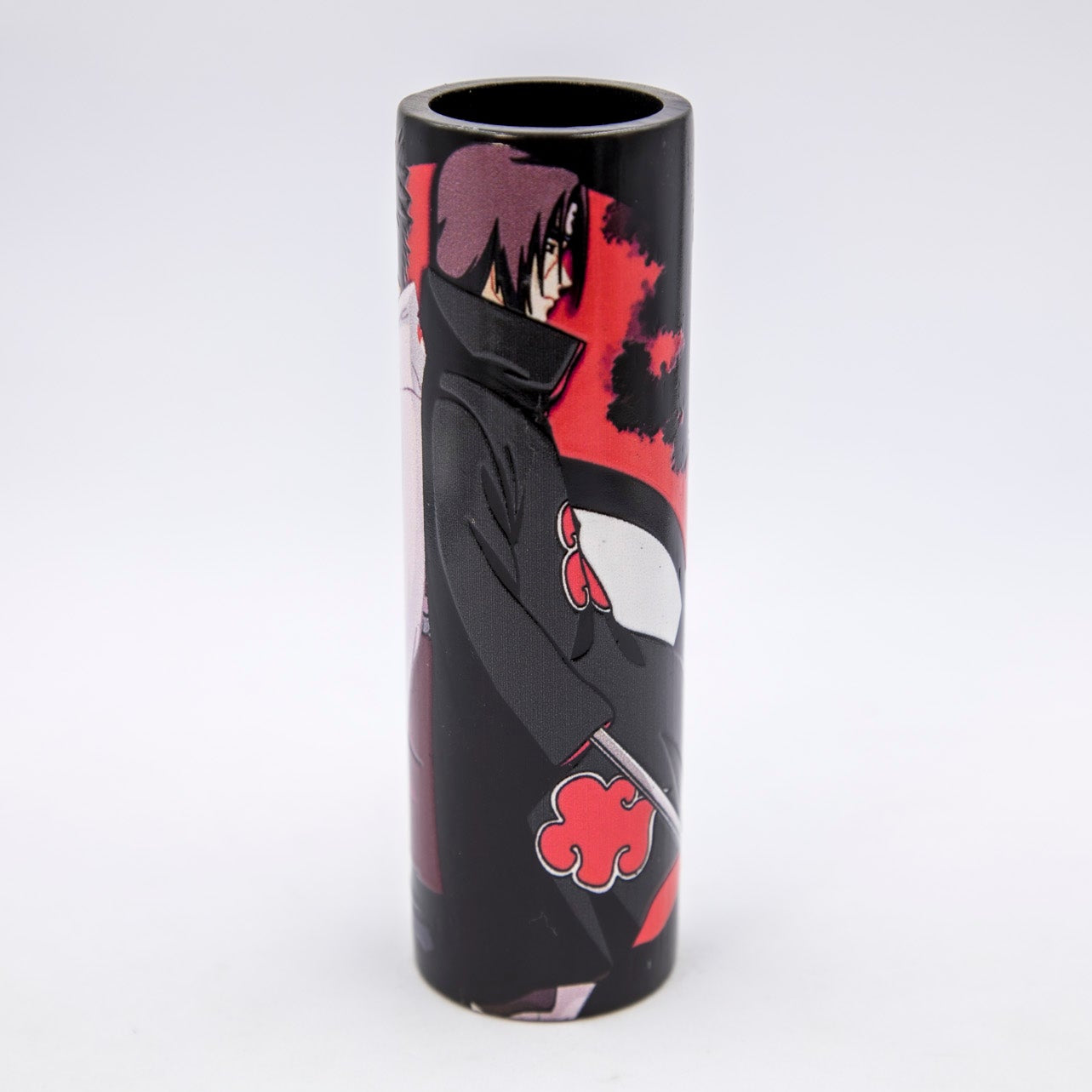 Cylindrical container with black and red design on a white background