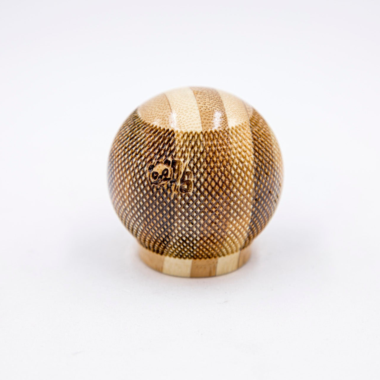 Decorative sphere with textured surface on a white background