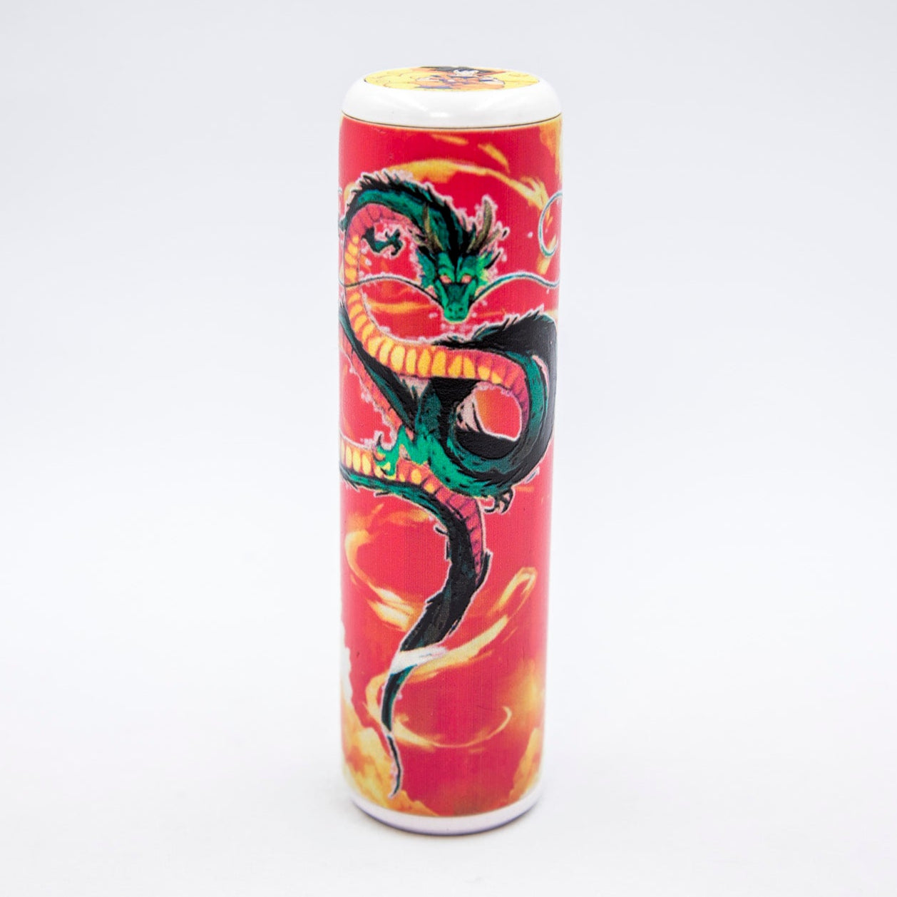 Cylindrical shift knob with dragon design on a red background